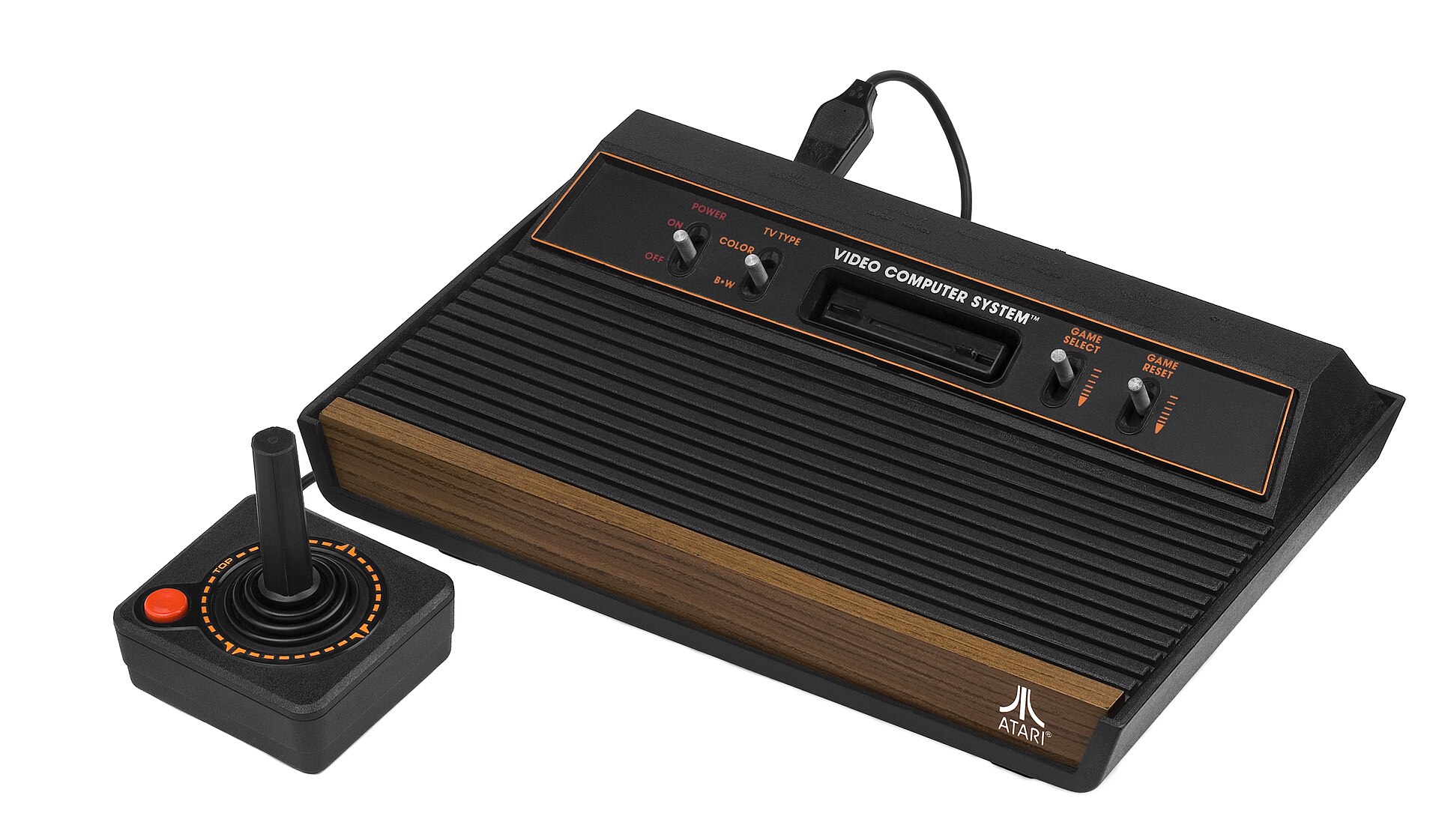 Atari 2600 wood-veneer four-switch console with joystick, the system that defined home video gaming
