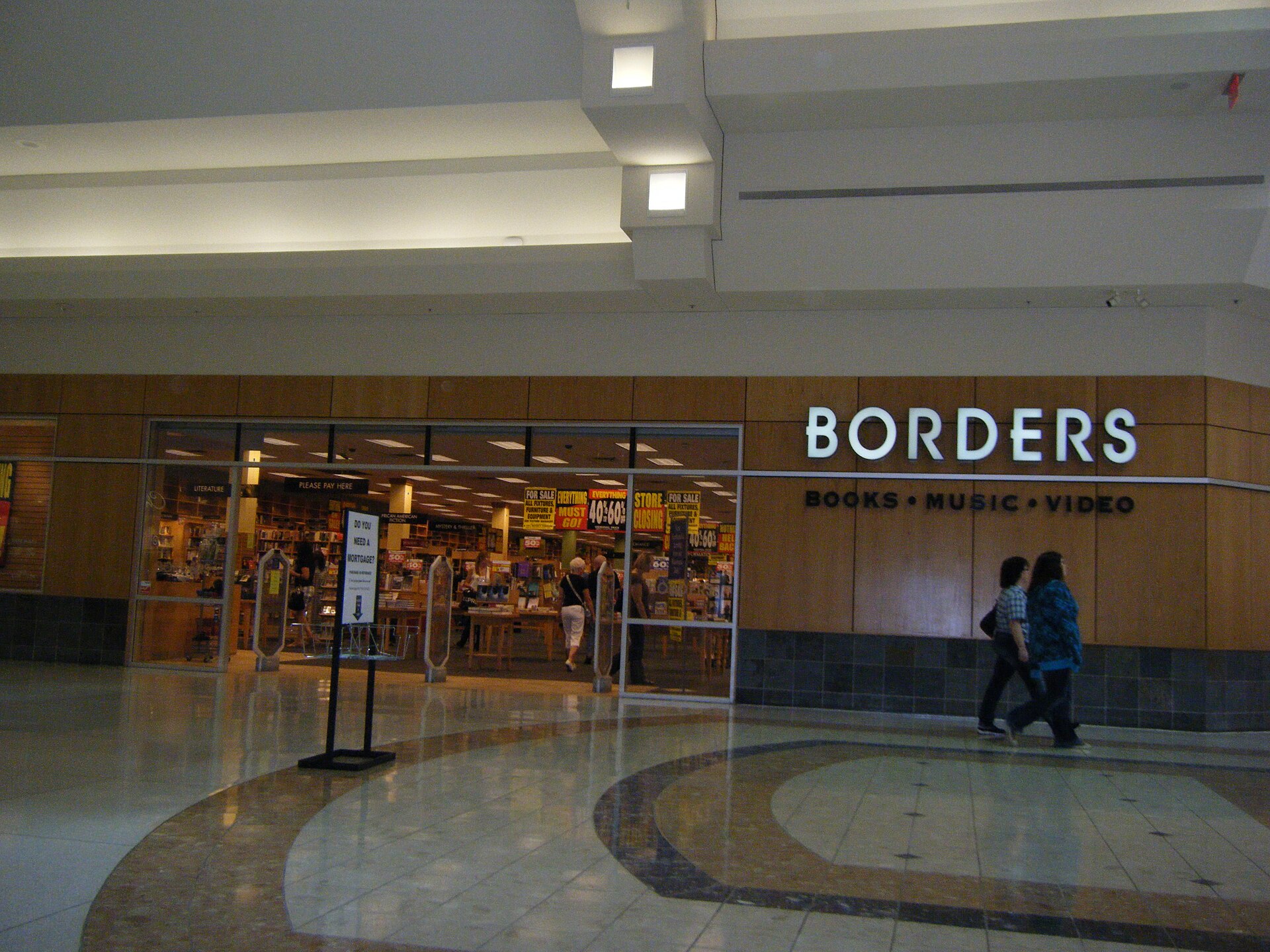 Borders bookstore entrance with liquidation 'Store Closing' sale signs, Oakland Mall, Troy, Michigan, August 2011