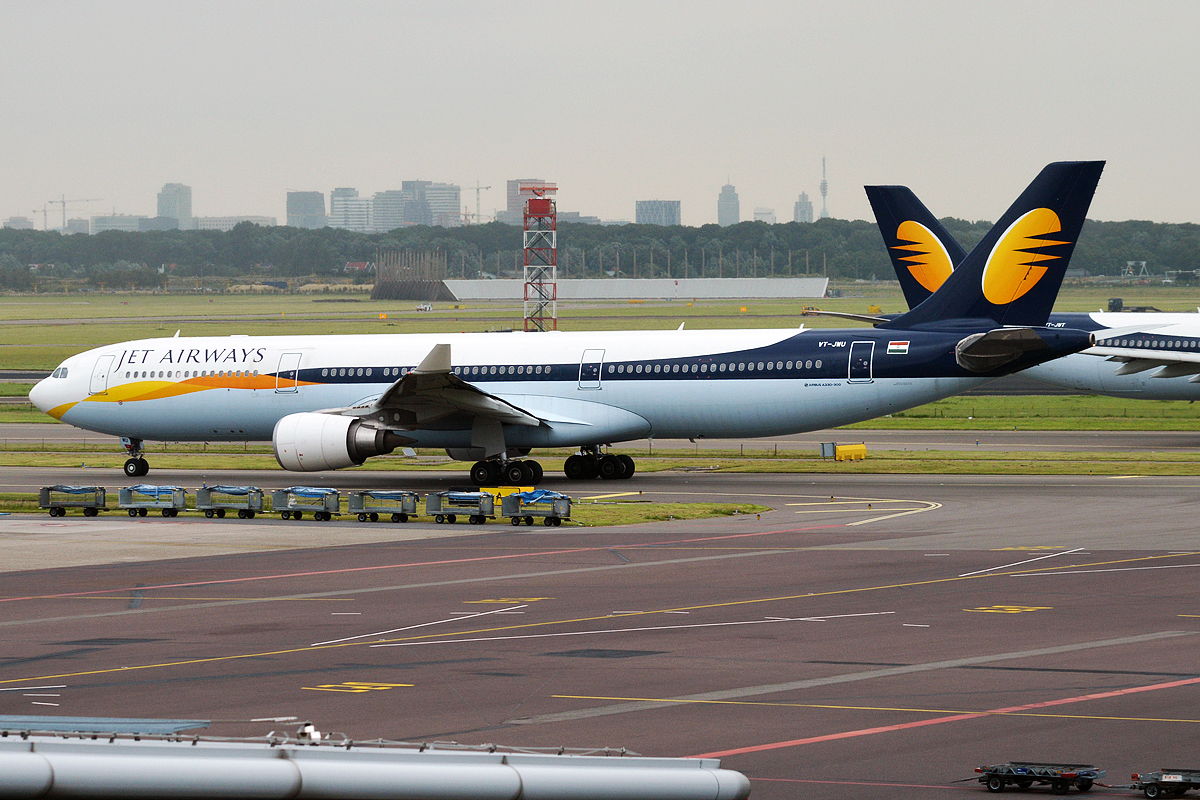 A Jet Airways Airbus A330-302 (VT-JWU) in the airline's tan-and-gold livery