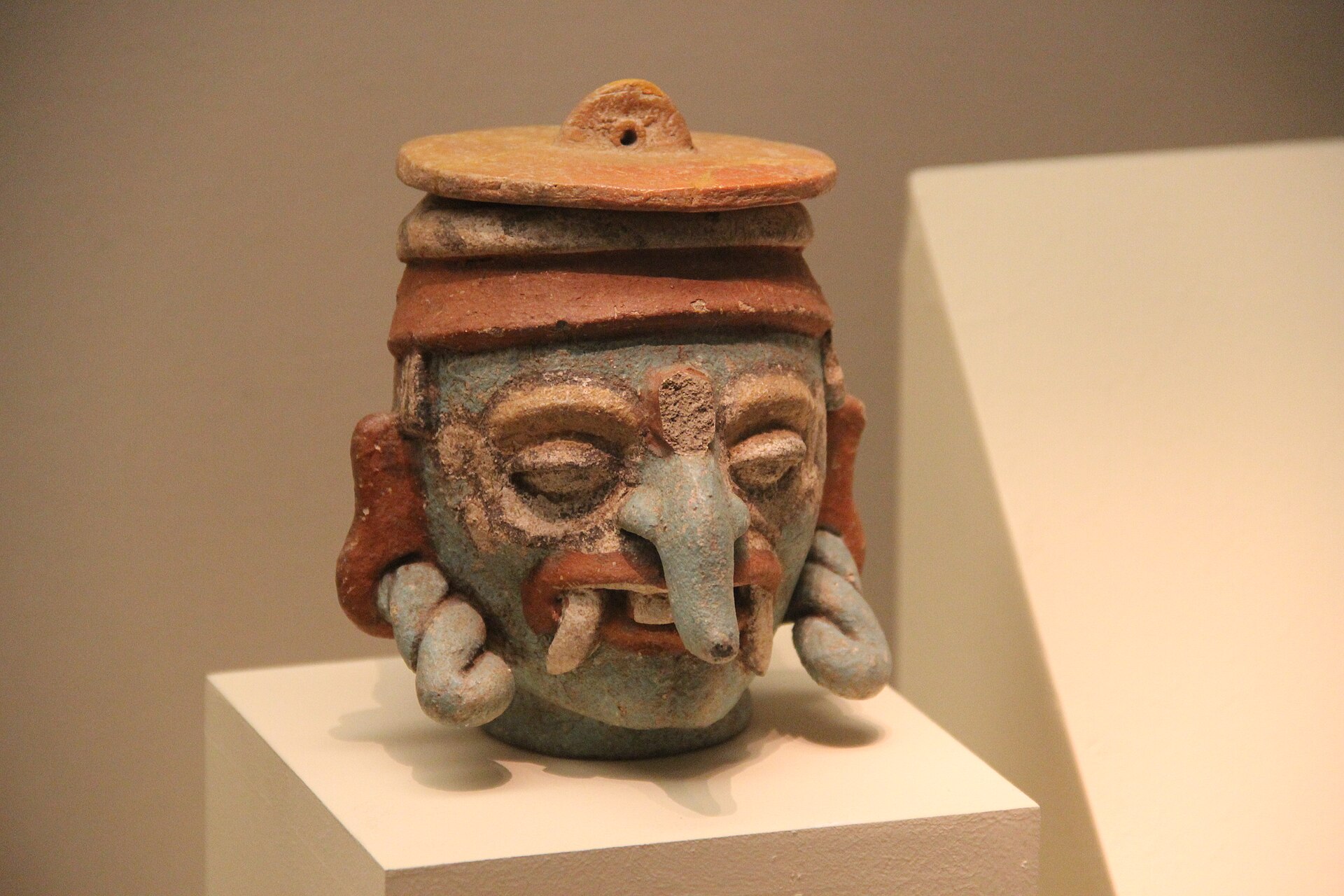 Ceramic effigy vessel in the form of the Maya rain god Chaac, with his characteristic long curved snout, Post-Classic 1250–1450 CE, National Museum of Anthropology, Mexico City
