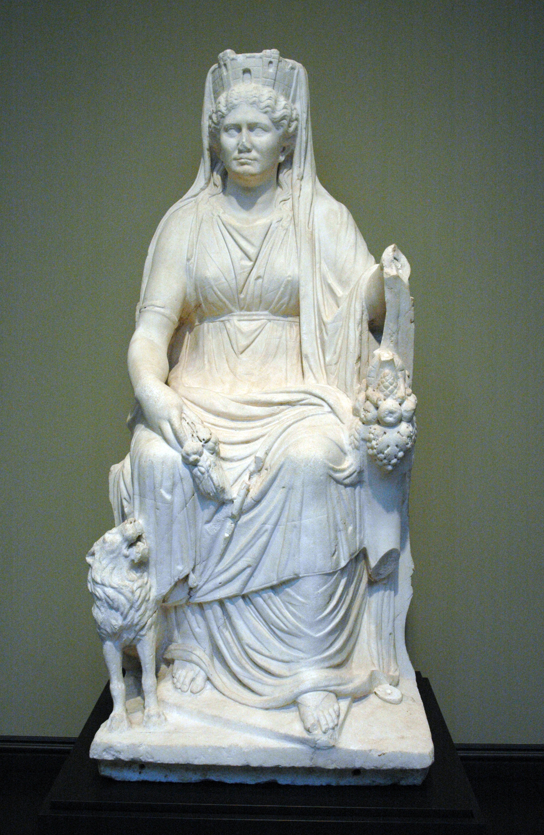 Roman marble statue of Cybele wearing a mural crown shaped like city walls, holding a cornucopia, with a lion, c. 50 CE, J. Paul Getty Museum