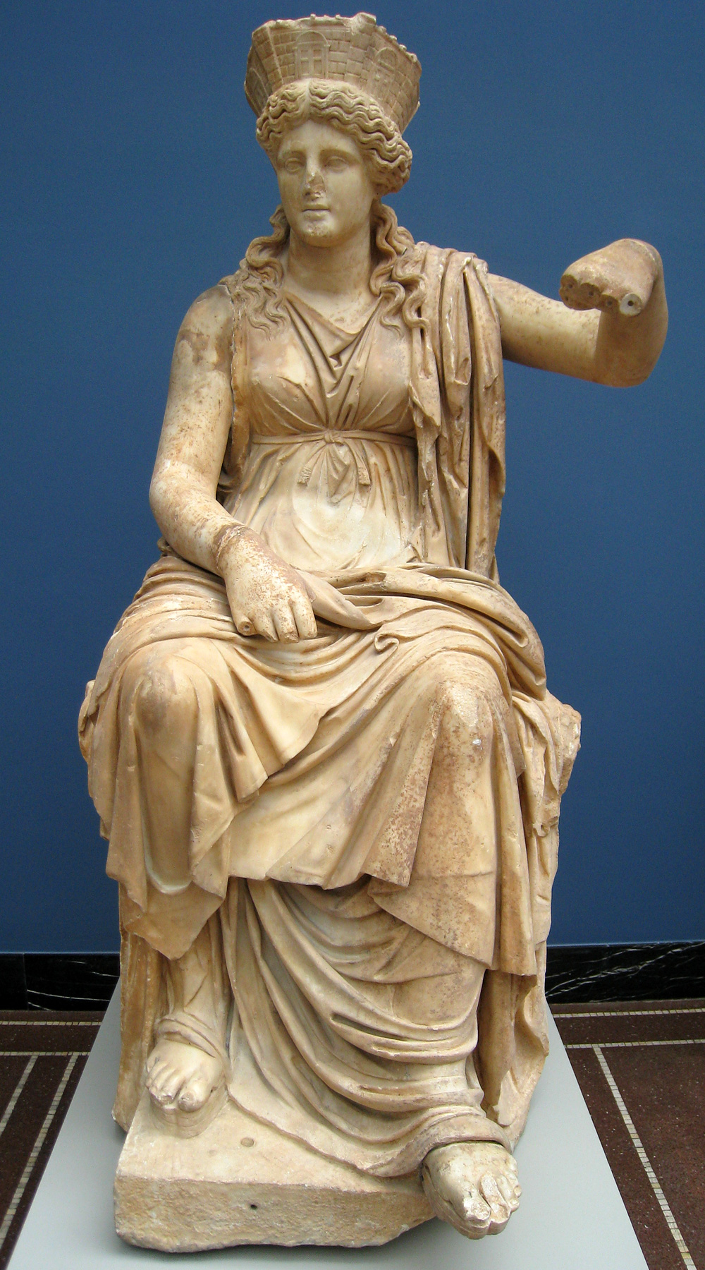 Marble statue of the goddess Cybele seated on a throne with a lion at her side, from Formia, c. 60 BCE