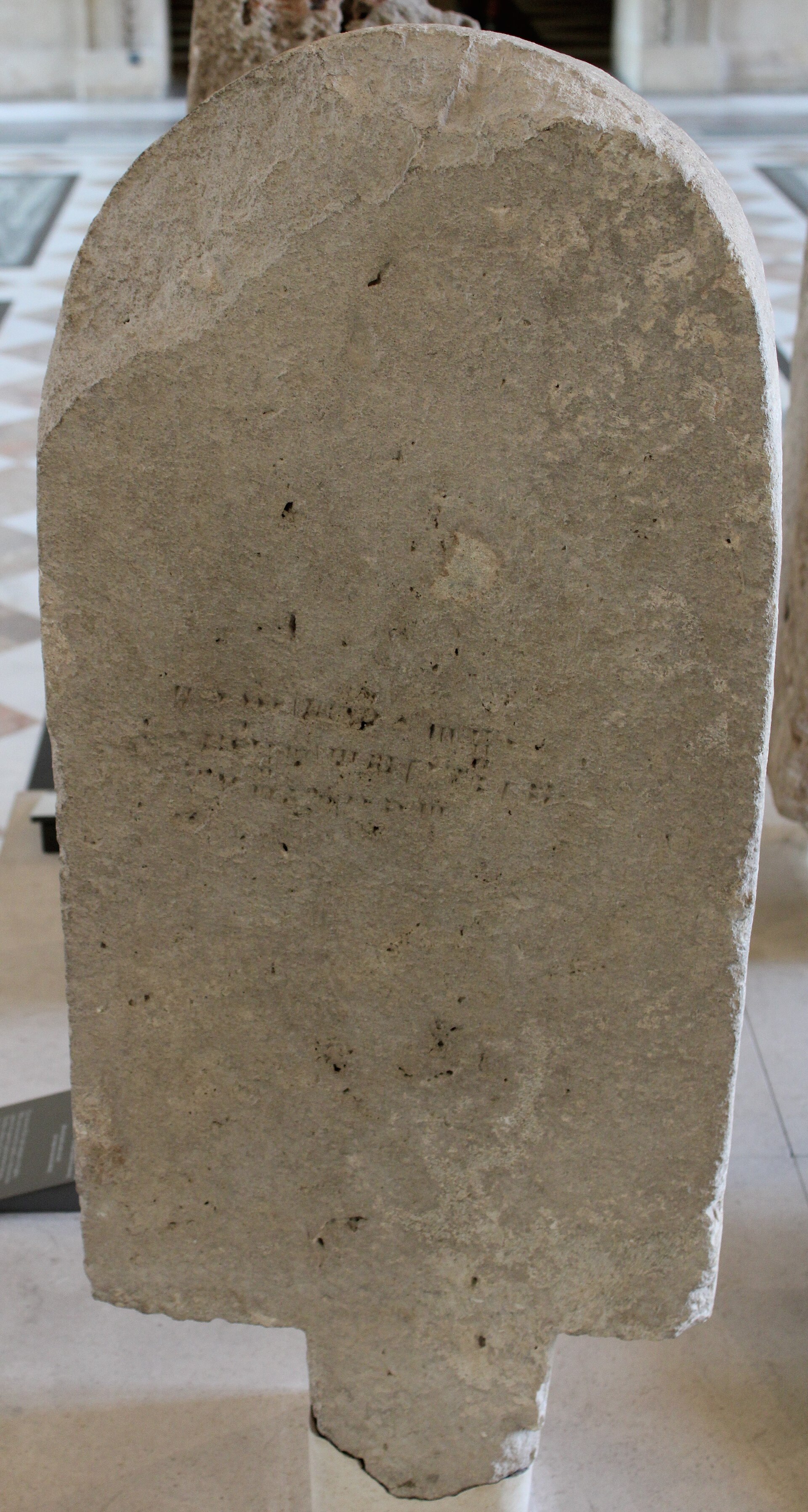 Sandstone stele bearing a Ugaritic cuneiform dedication to the god Dagan, 13th century BCE, from the Temple of Dagan at Ugarit, Louvre Museum