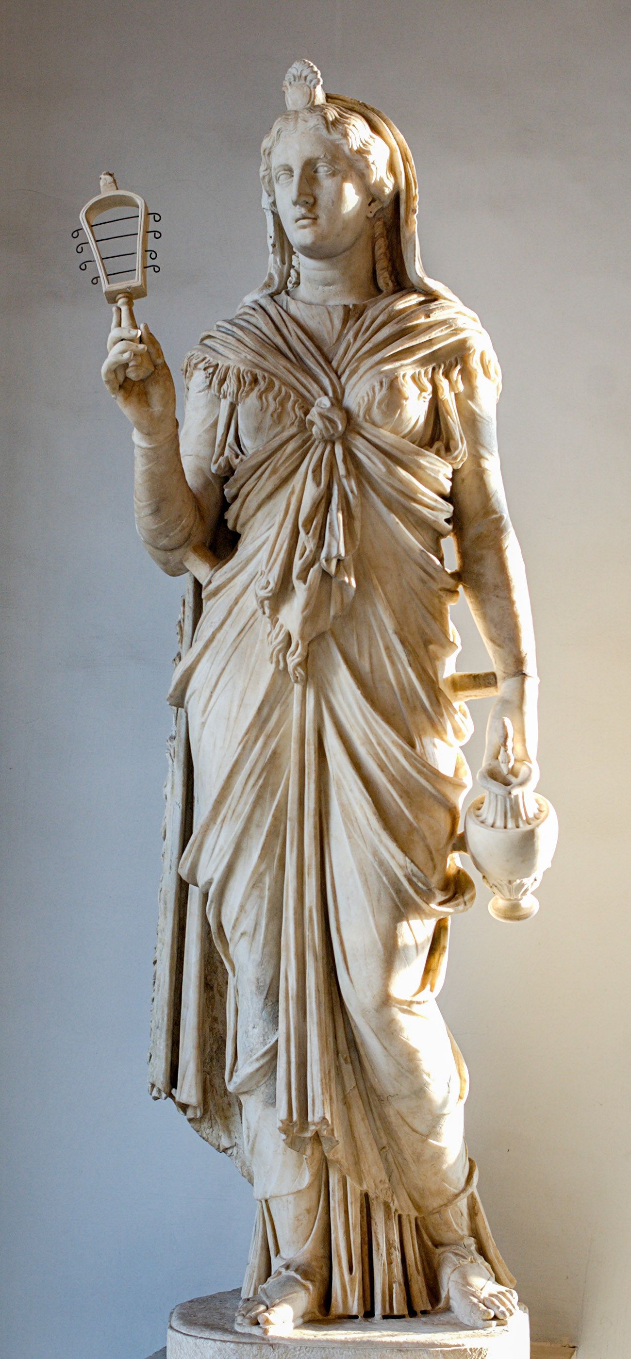 Roman marble statue of the goddess Isis holding a sistrum and a pouring vessel, Hadrianic period, Capitoline Museums, Rome