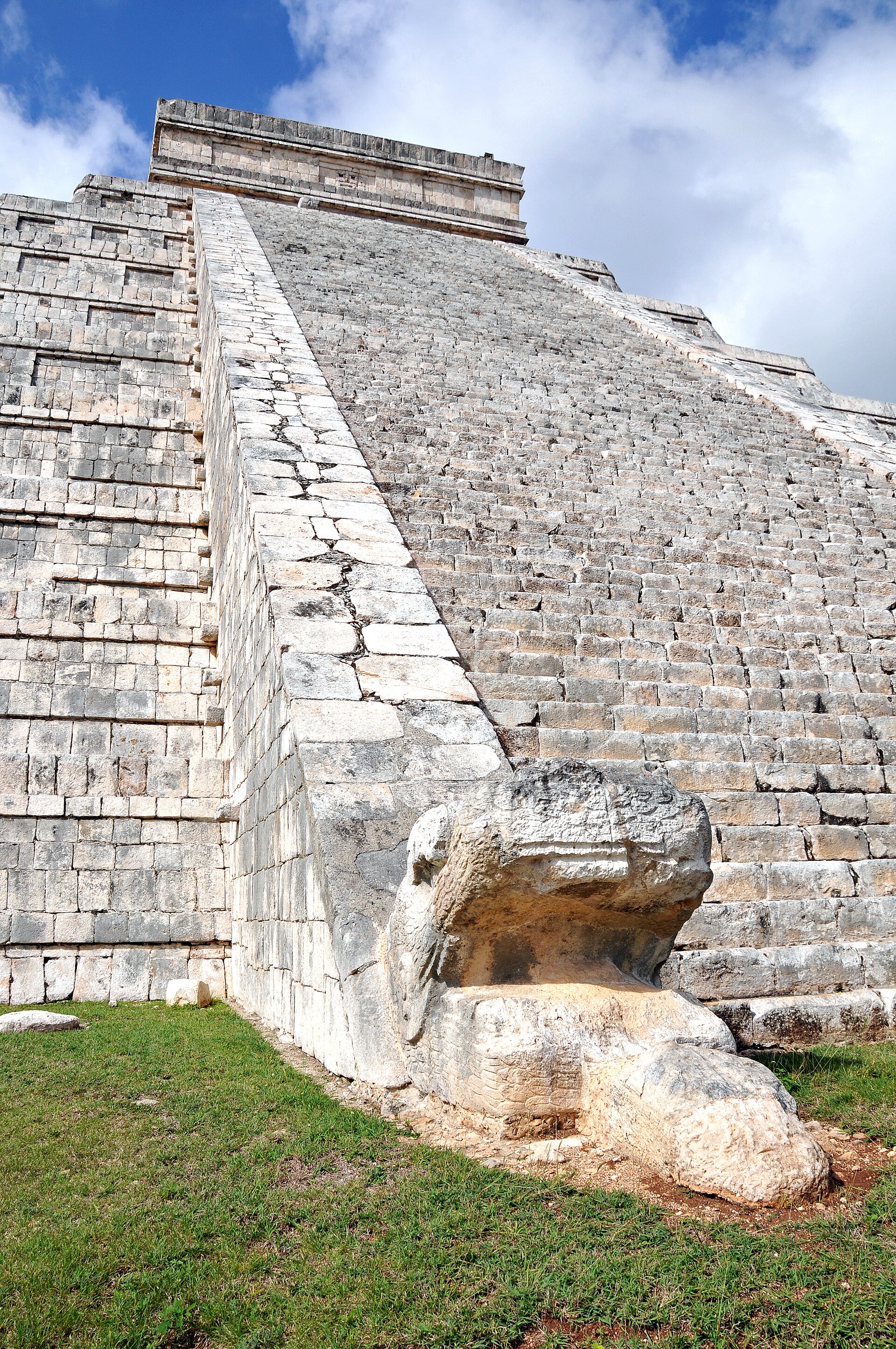 Carved feathered-serpent balustrade at the foot of El Castillo, Chichen Itza