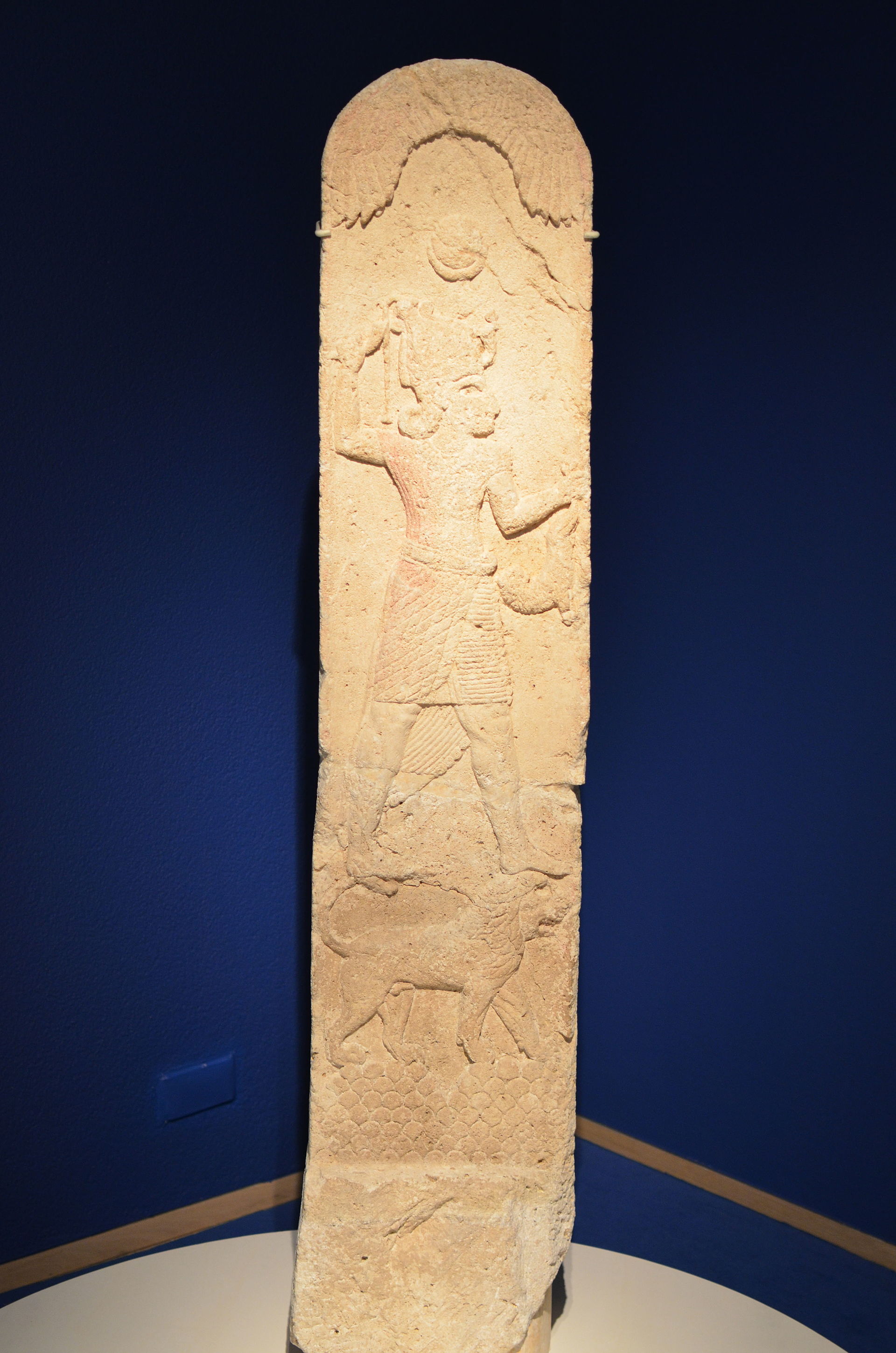 Stela from Amrit depicting Melqart standing on a lion