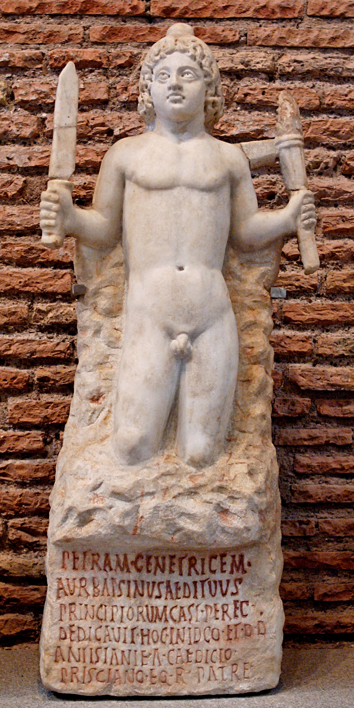 Roman statue of Mithras emerging from a rock, the petra genetrix, the young god rising naked from the stone