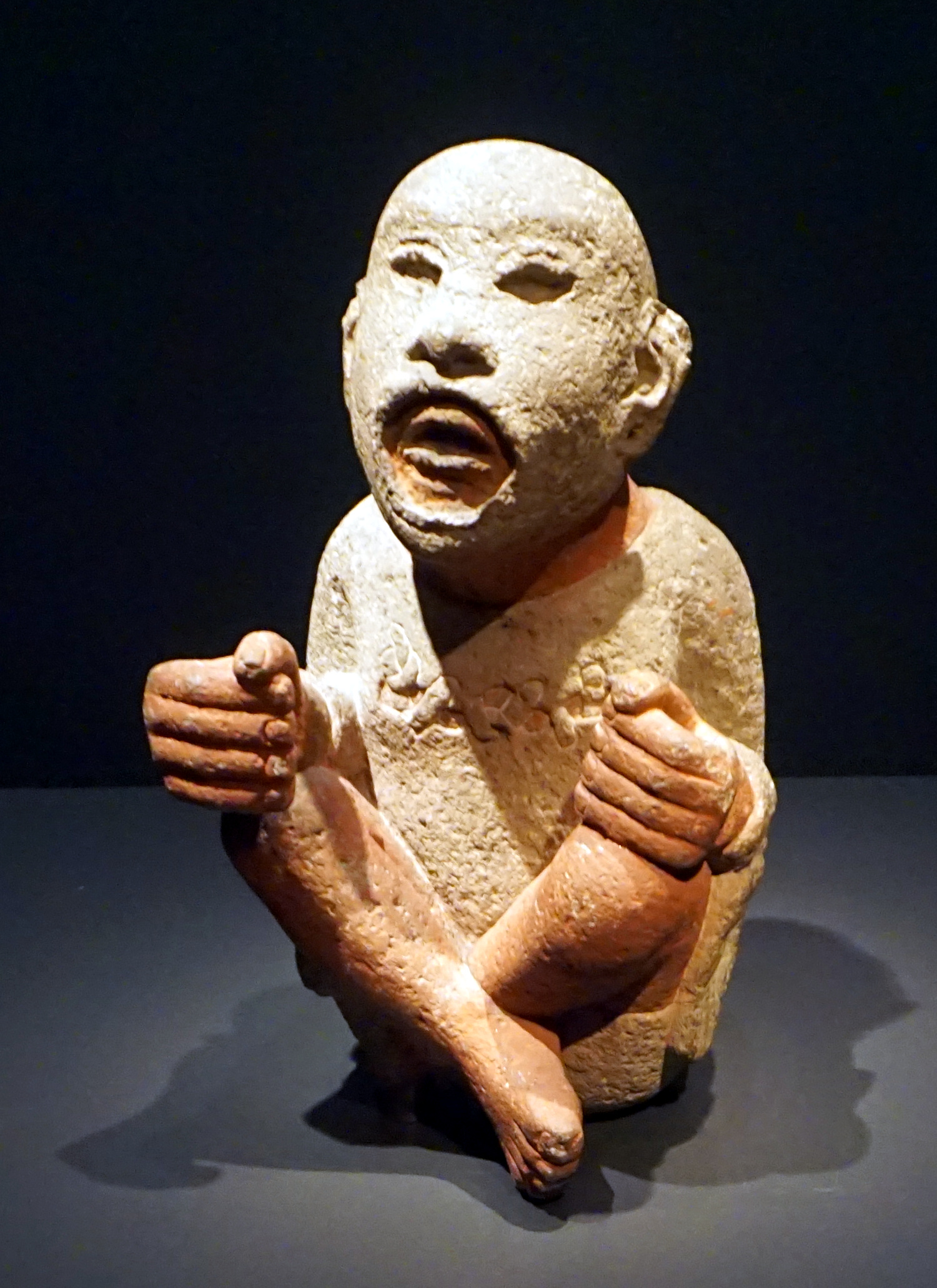 Aztec stone statue of Xipe Totec, the Flayed Lord