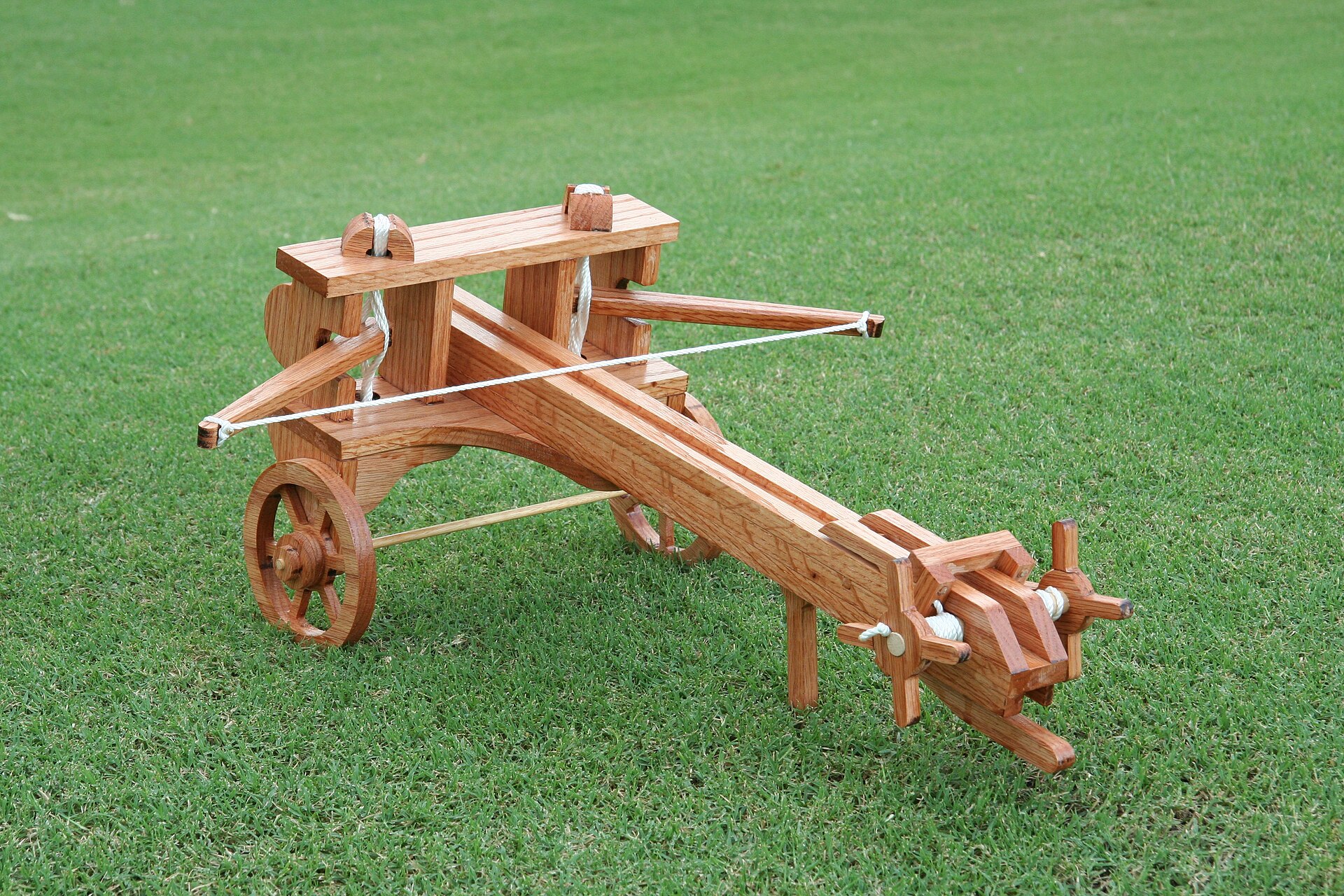 A modern reconstruction of a Greek or Roman ballista built from a kit, showing the twin torsion-spring frame and bolt trough
