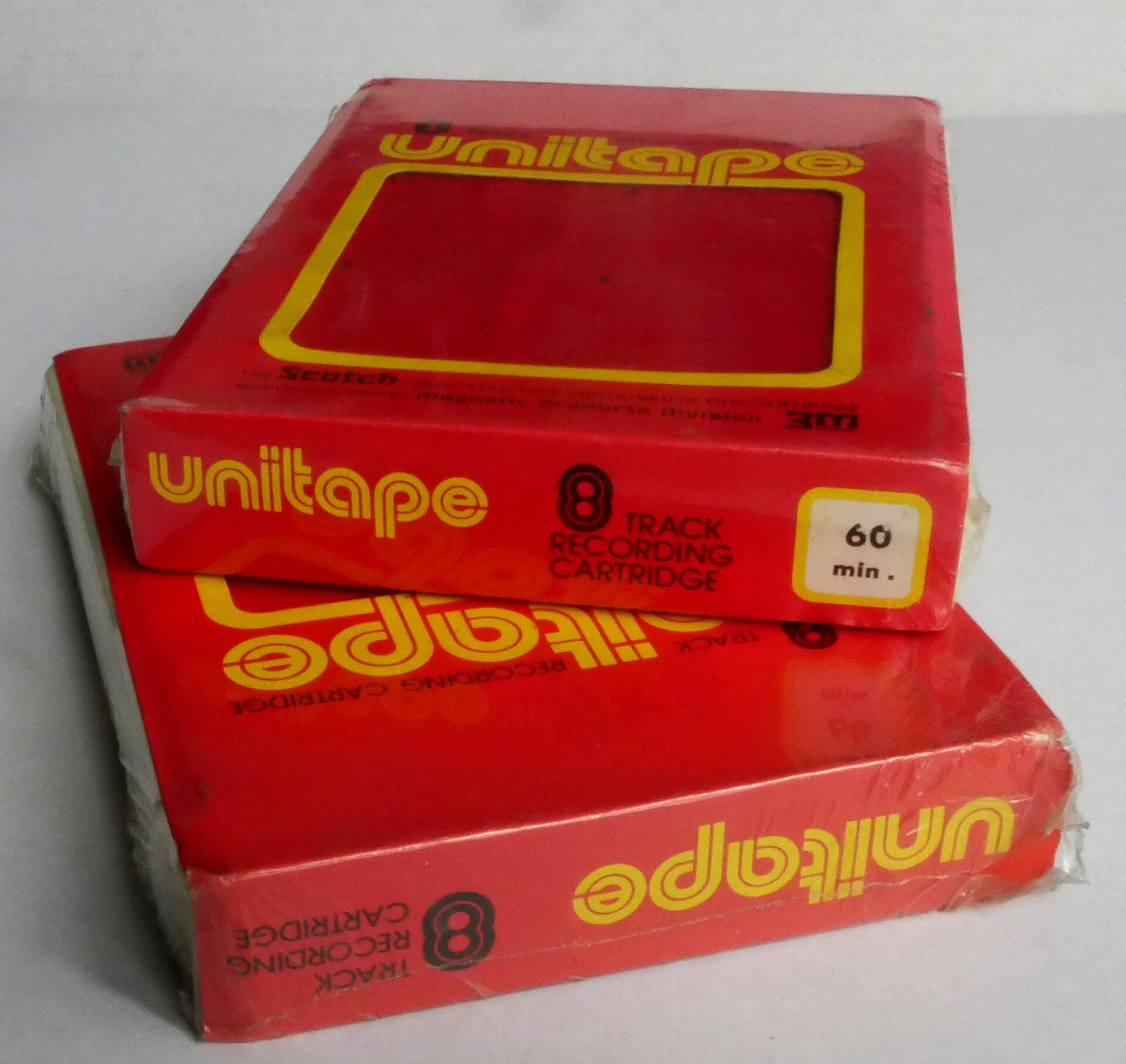 An 8-track tape cartridge, the bulky plastic magnetic-tape music format of the 1960s and 1970s.