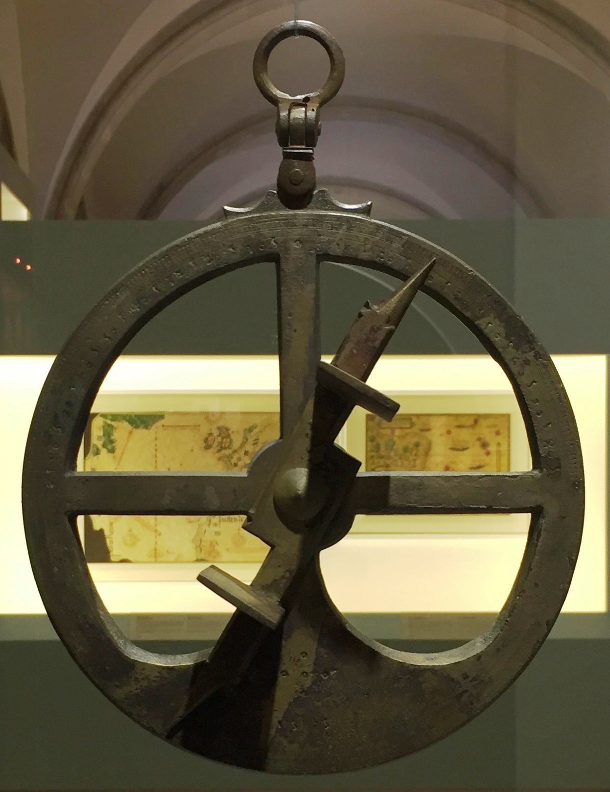 A cast-bronze mariner's astrolabe of about 1600, recovered from a shipwreck at Ria de Aveiro, Portugal, with its open-frame body and rotating sighting vane