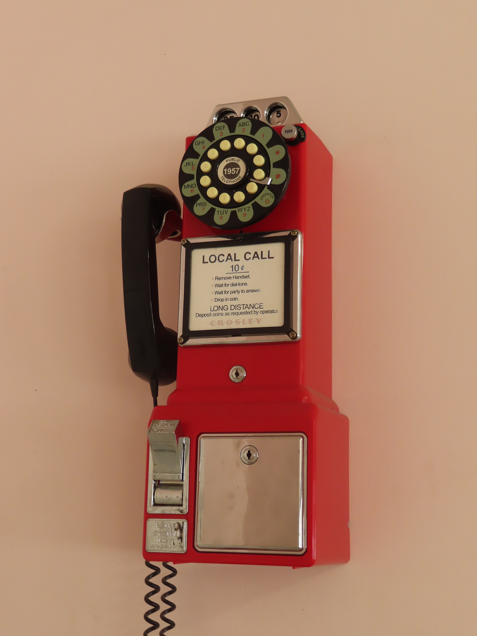 Coin payphone mounted outdoors in St. Anne, Illinois