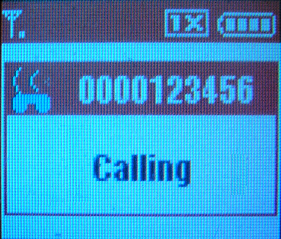 A Motorola RAZR V3c phone screen showing an incoming SkypeOut call notification, circa 2007.