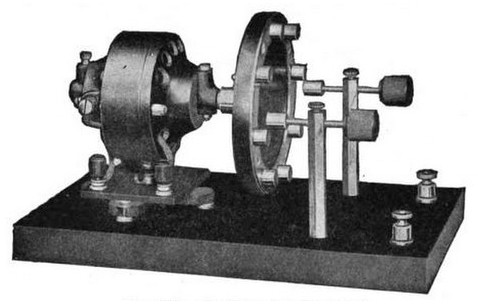 A 1919 rotary spark gap: a motor-driven wheel with electrodes around its rim striking fixed contacts to produce the rapid sparks that excited the transmitter's tuned circuit