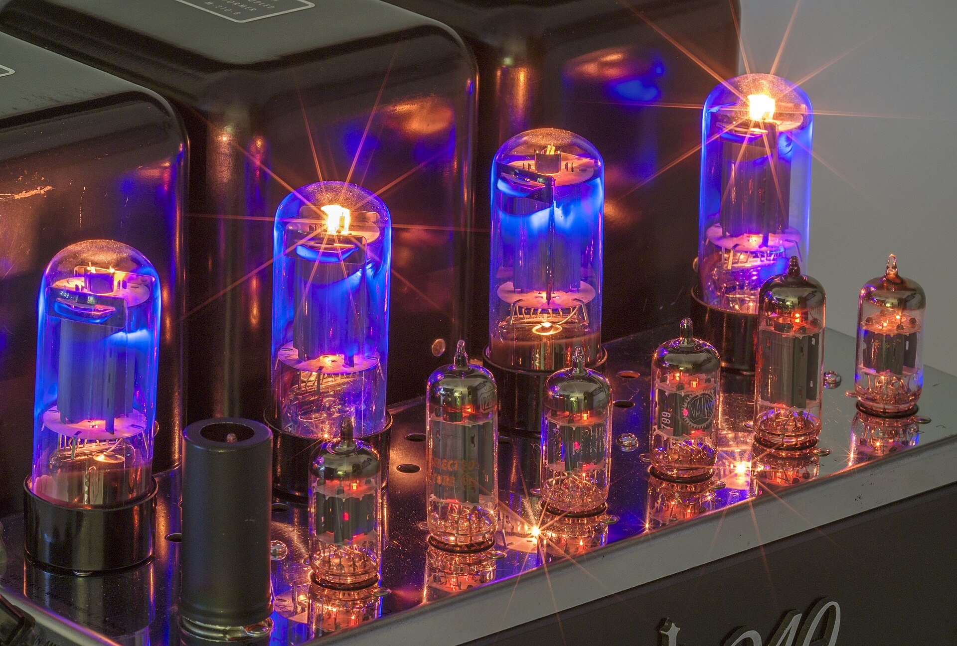 Glowing vacuum tubes inside a McIntosh MC240 audio amplifier