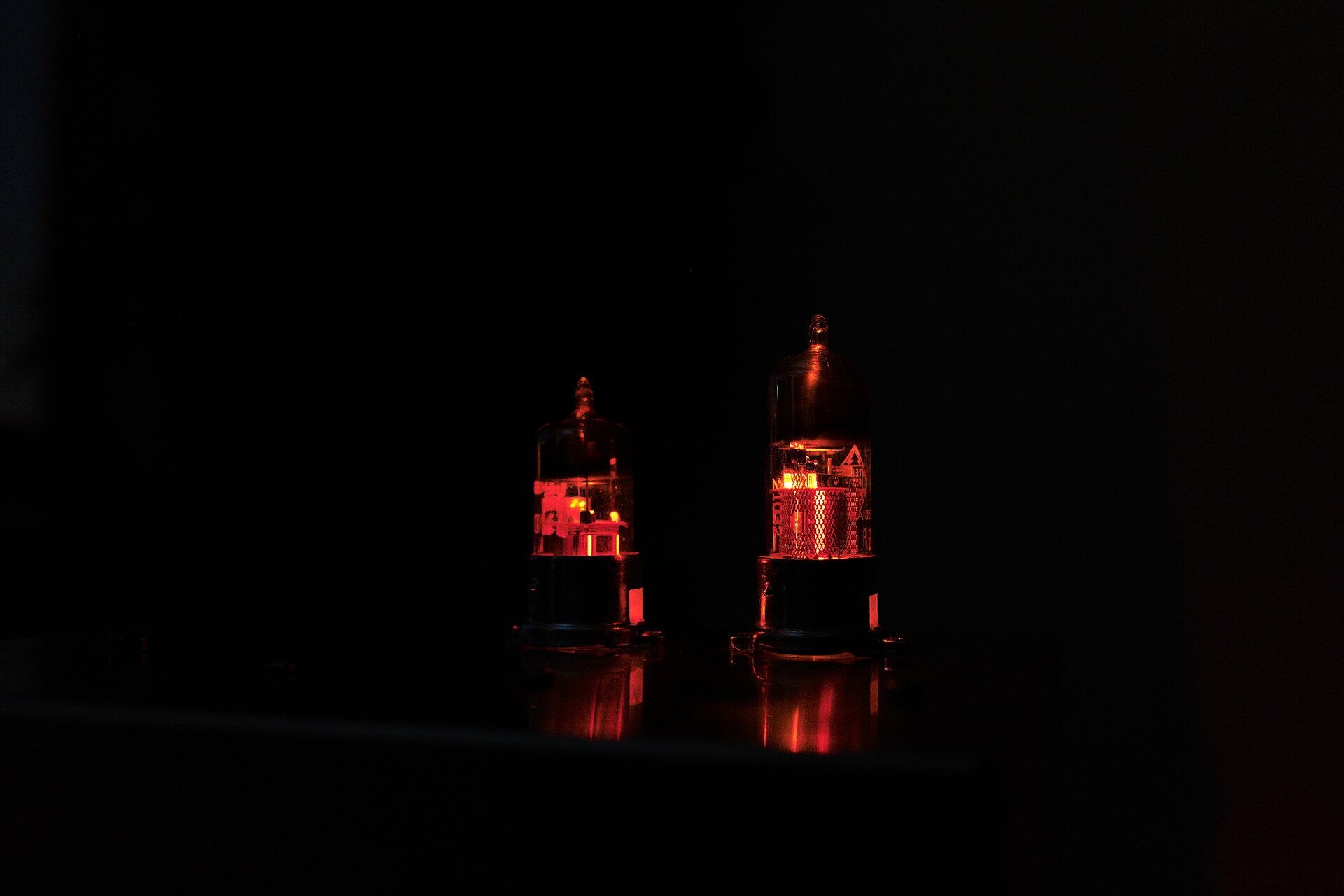 Close-up of glowing electron vacuum tubes in operation