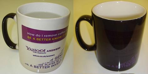 A ceramic mug branded with the Yahoo! Answers logo.
