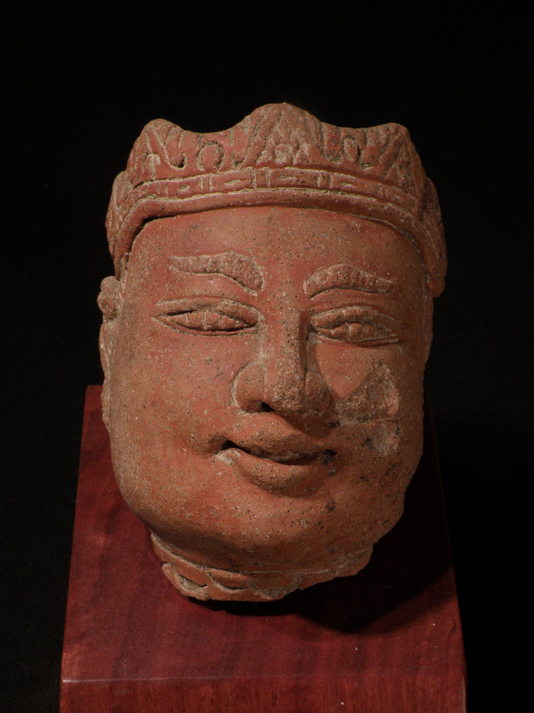 A red-pigmented Majapahit-era terracotta head, traditionally said to depict the minister Gajah Mada, from the Trowulan region