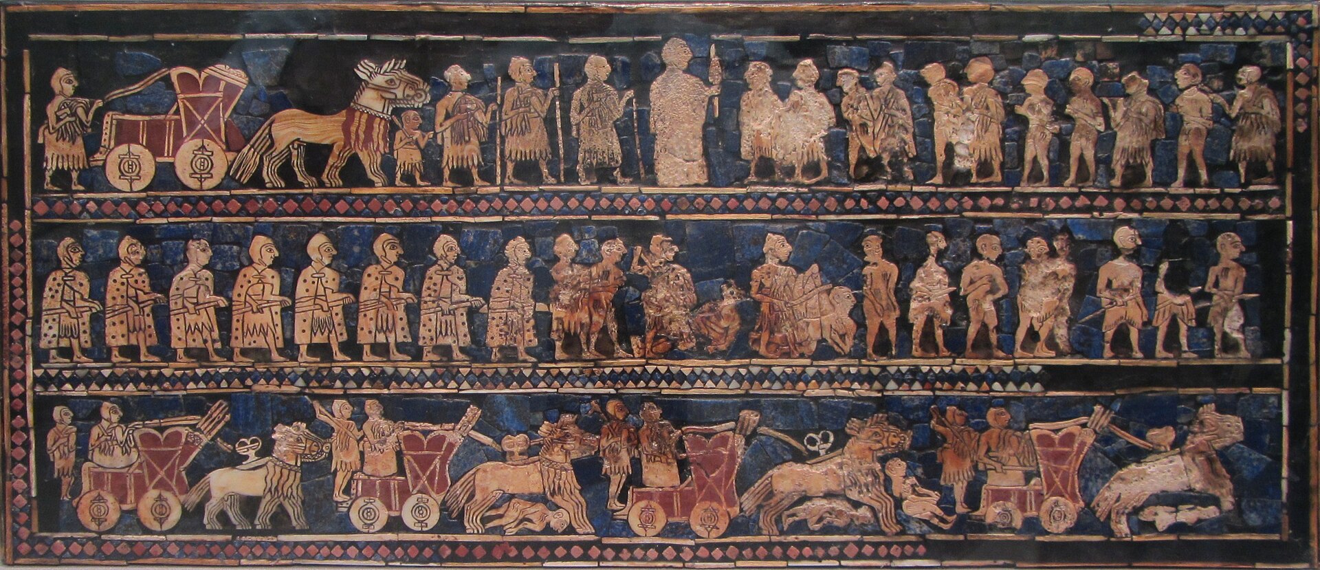 The 'War' panel of the Standard of Ur, a Sumerian shell-and-lapis mosaic, c. 2600-2400 BCE, British Museum.