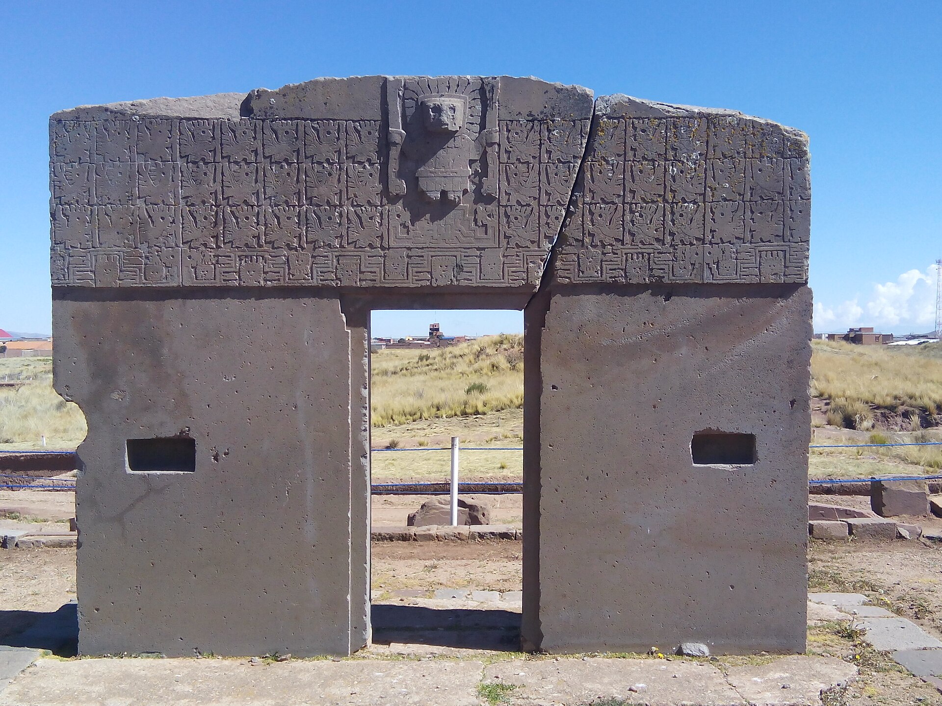 The Gateway of the Sun at Tiwanaku, Bolivia — a monolithic andesite portal carved with a central Staff Deity and 48 winged figures, c. 800–1000 CE